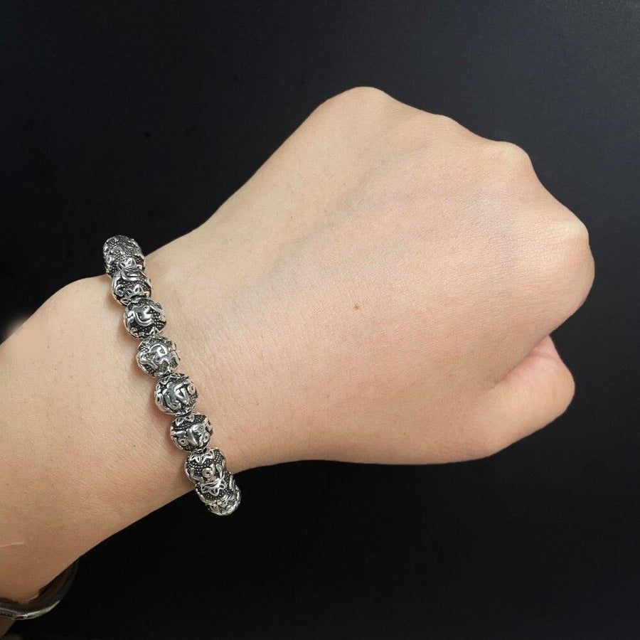 Bracelet «Paix intérieure» en cuivre antique Om Mani Padme Hum