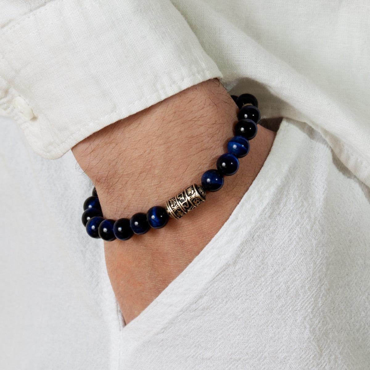 Bracelet Perles de pierres d'Œil de tigre bleu et totem bouddhiste