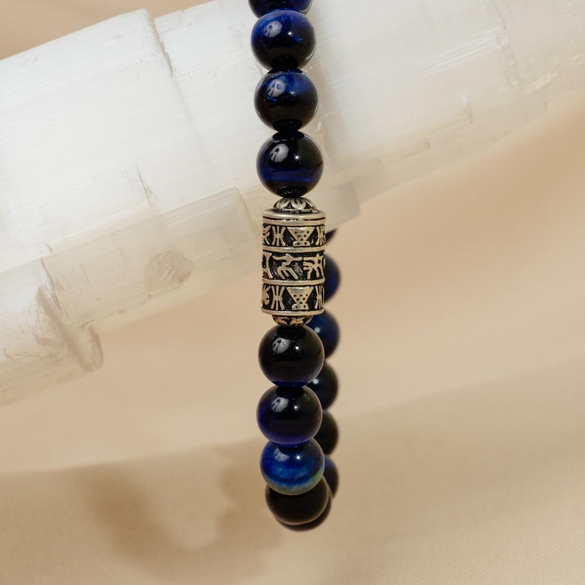 Bracelet Perles de pierres d'Œil de tigre bleu et totem bouddhiste