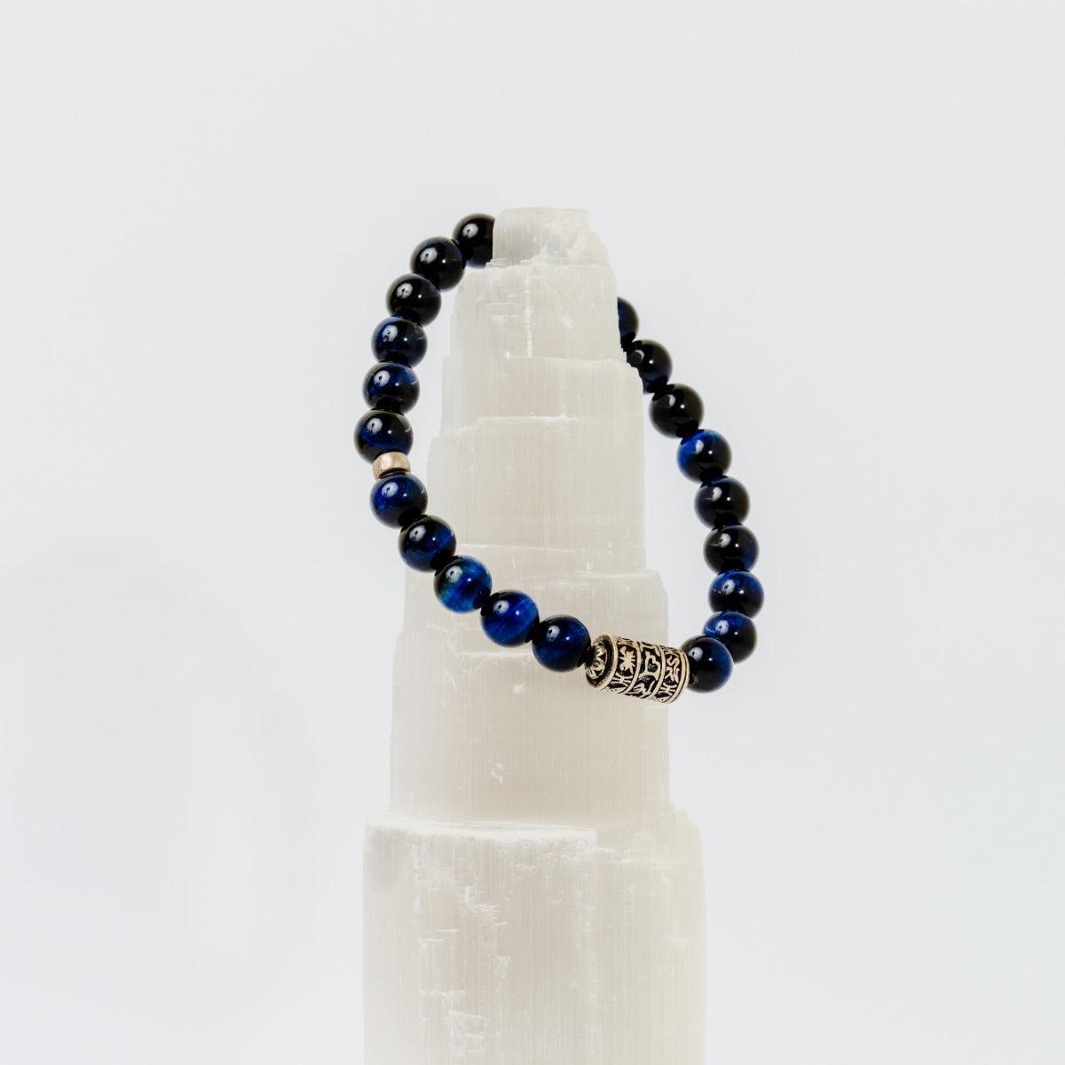 Bracelet Perles de pierres d'Œil de tigre bleu et totem bouddhiste