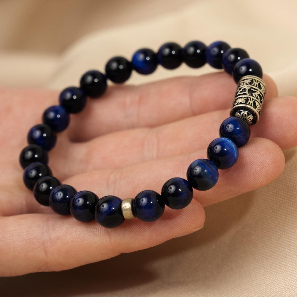 Bracelet Perles de pierres d'Œil de tigre bleu et totem bouddhiste