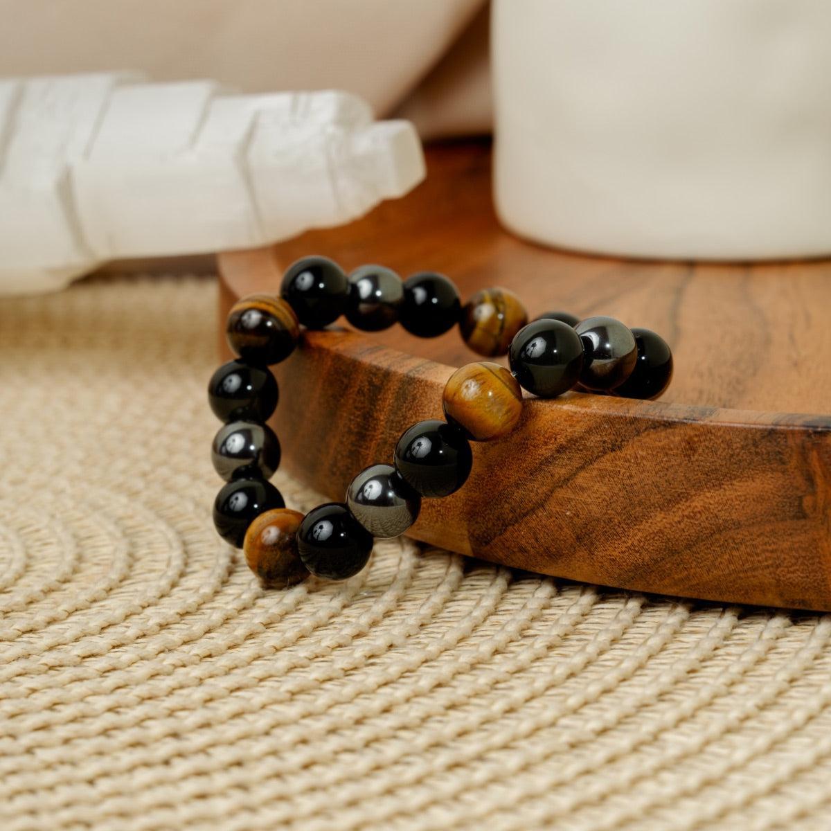 Bracelet «Triple protection» en obsidienne noire, oeil de tigre et hématite.