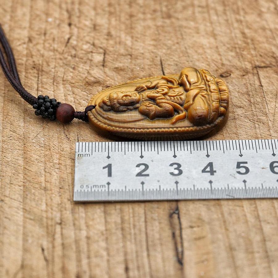 Collier en pierre naturelle en Œil de tigre sculpté à l’effigie de Bouddha