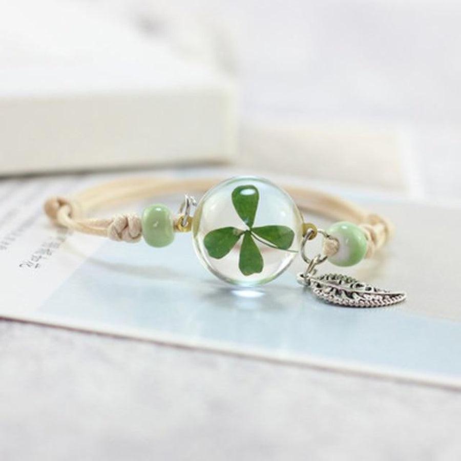 Bracelet Boule et charme feuille