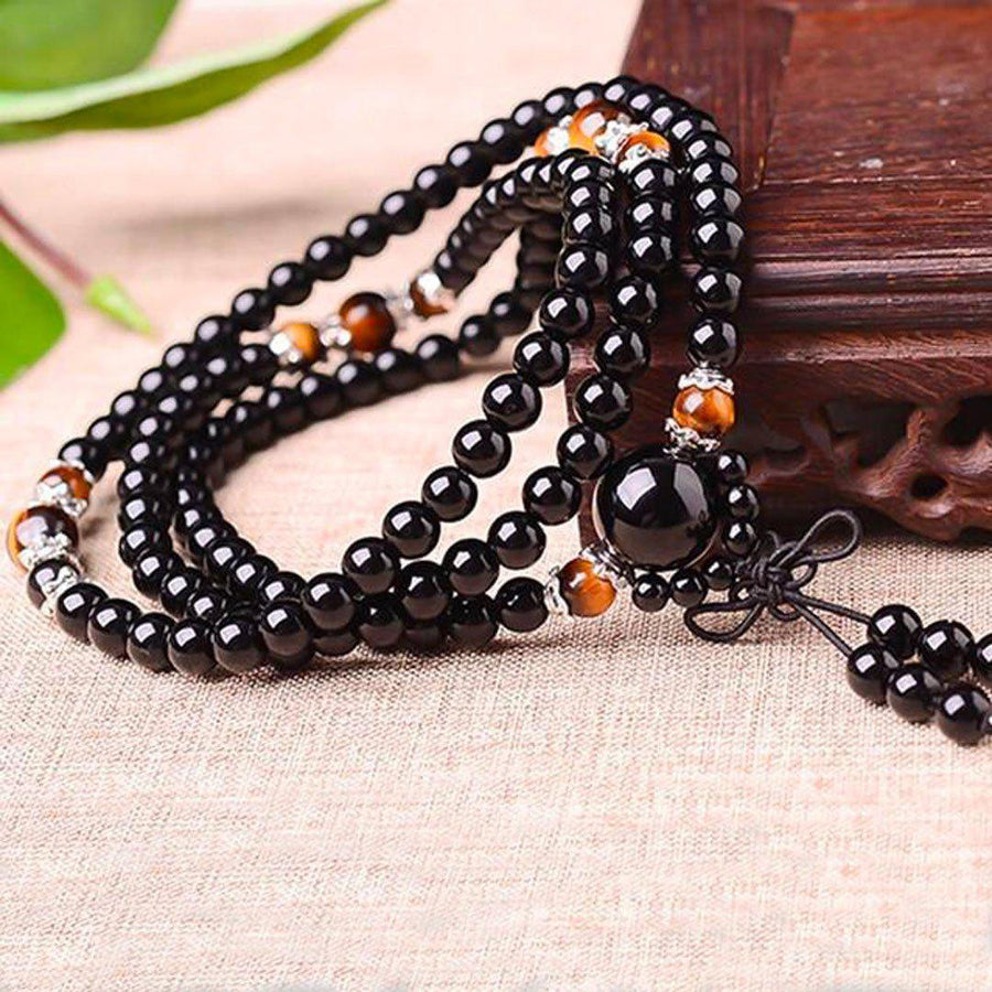 Mala 108 perles «confiance en soi» en Onyx noir