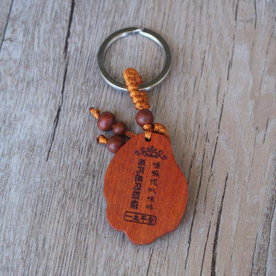 Porte clés Bouddha sur une feuille de lotus