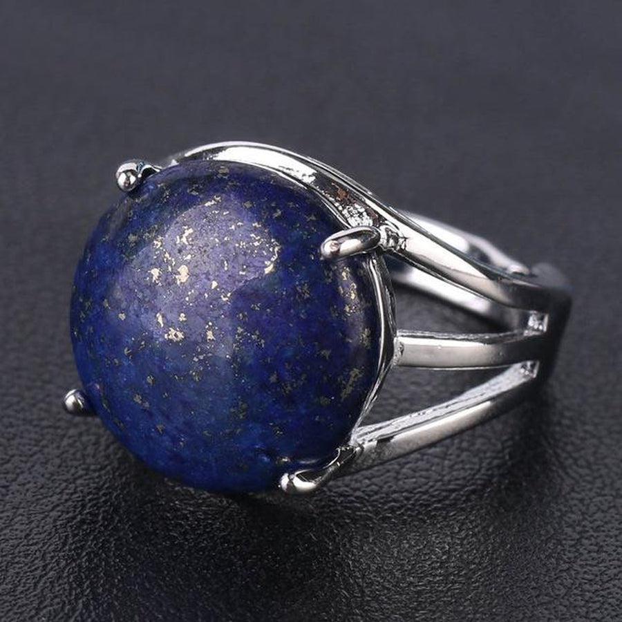 Bague cabochon en pierre sertie griffes