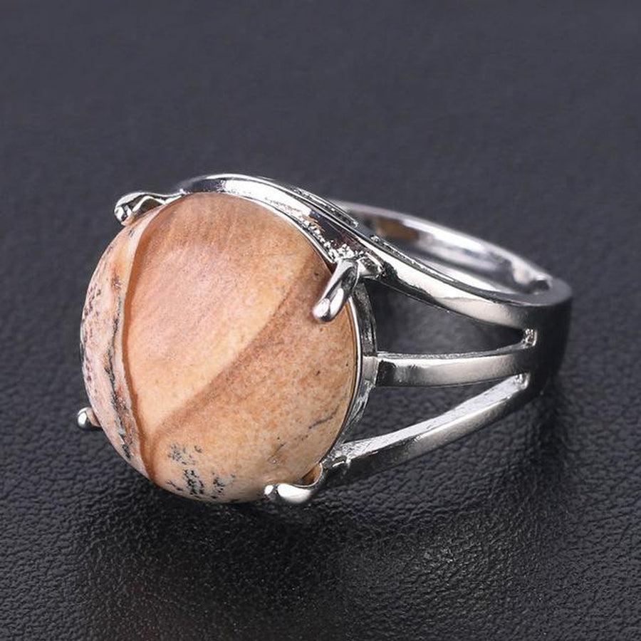 Bague cabochon en pierre sertie griffes