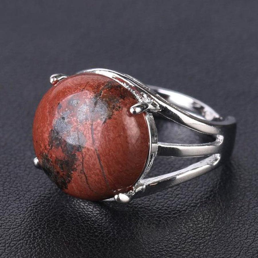 Bague cabochon en pierre sertie griffes