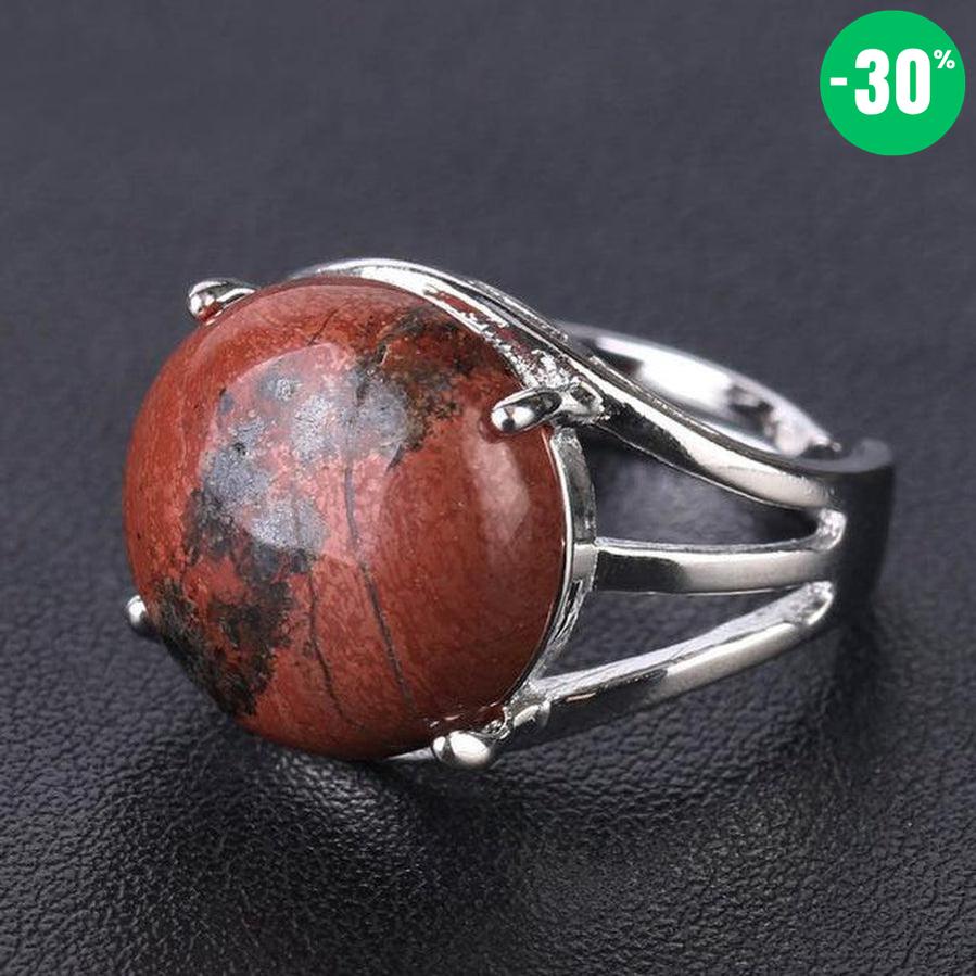 Bague cabochon en pierre sertie griffes