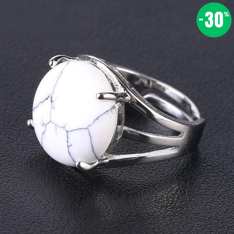 Bague cabochon en pierre sertie griffes