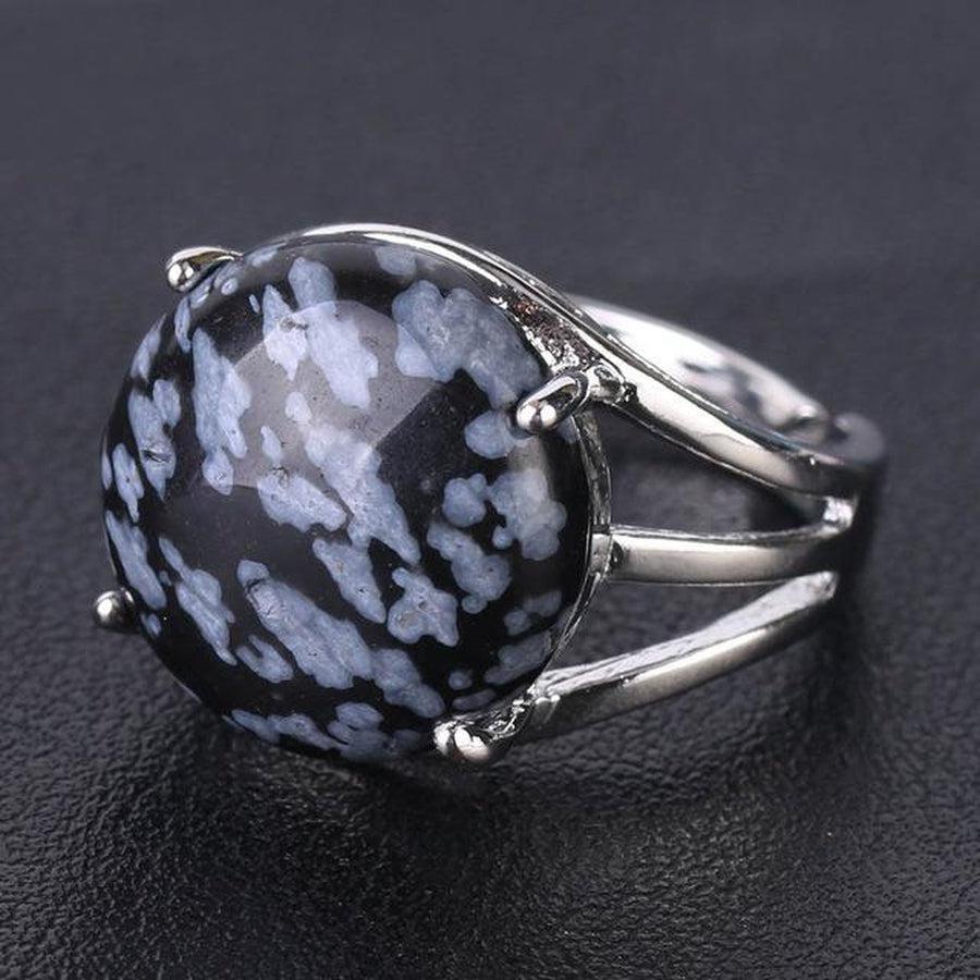 Bague cabochon en pierre sertie griffes