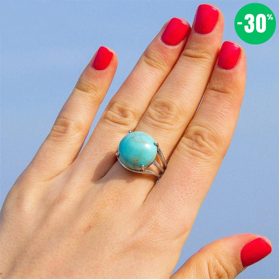 Bague cabochon en pierre sertie griffes