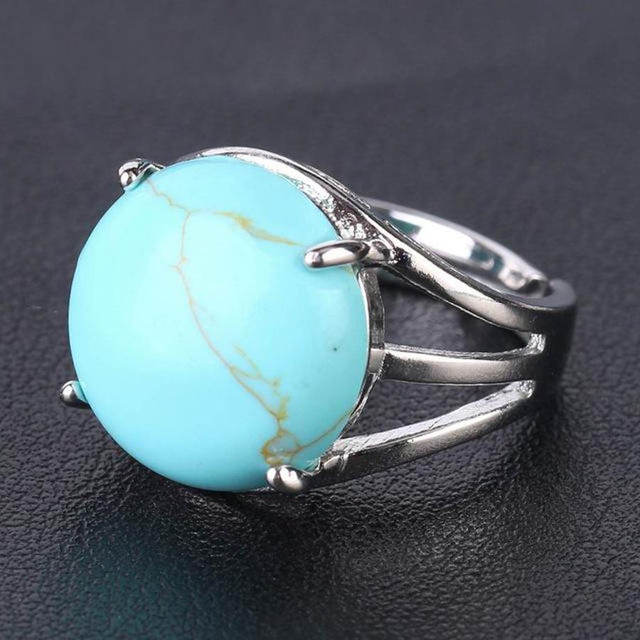 Bague cabochon en pierre sertie griffes