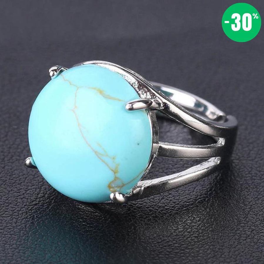 Bague cabochon en pierre sertie griffes