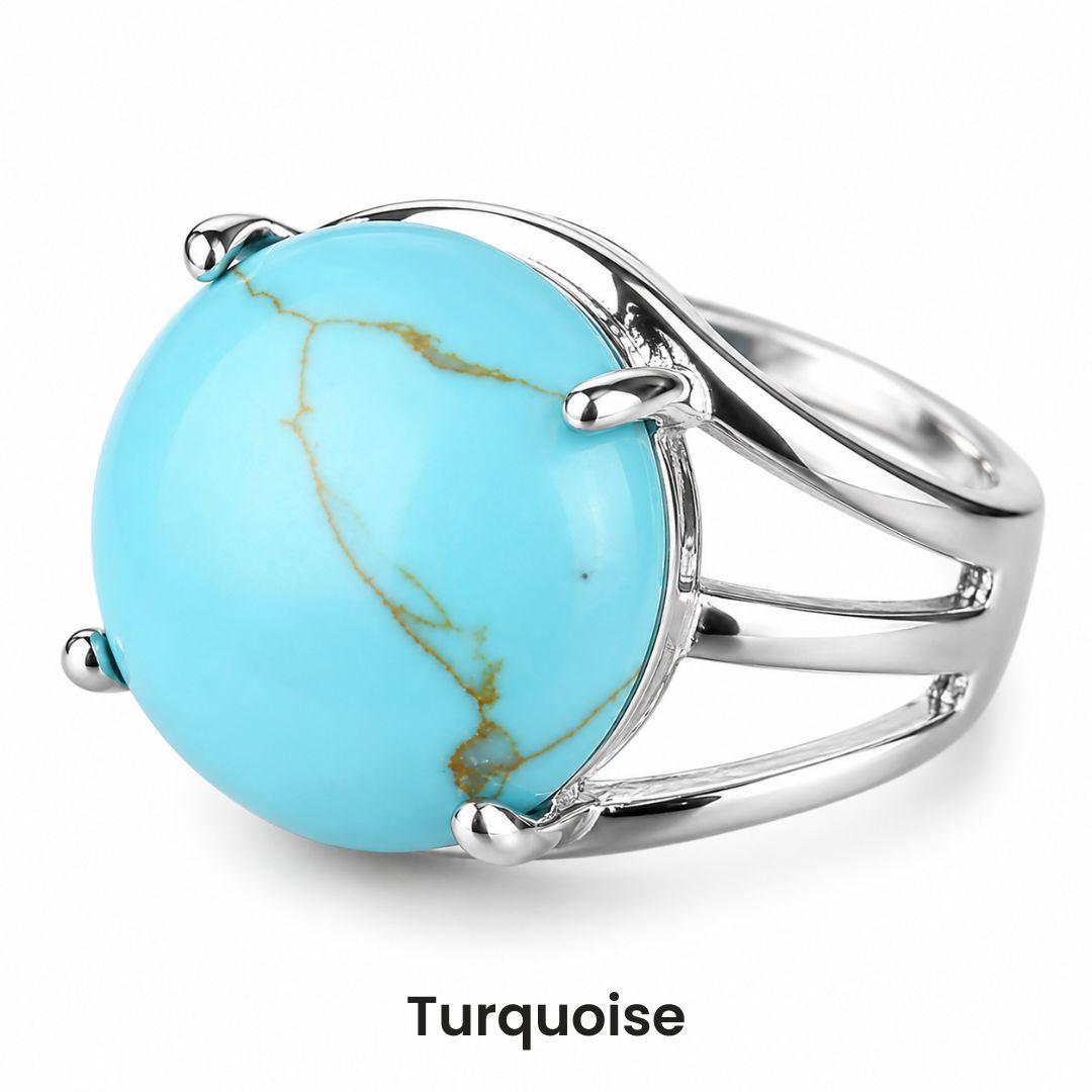 Bague cabochon en pierre sertie griffes