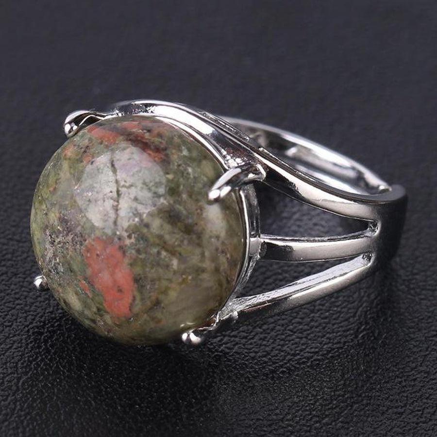 Bague cabochon en pierre sertie griffes