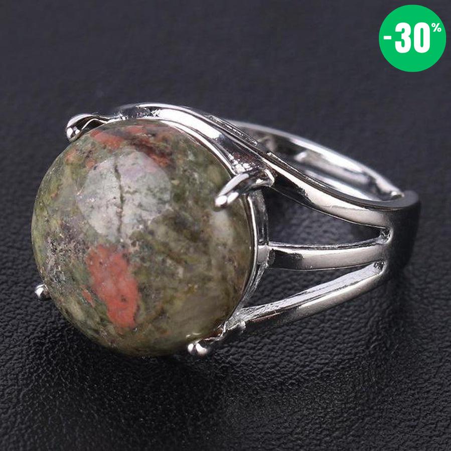 Bague cabochon en pierre sertie griffes