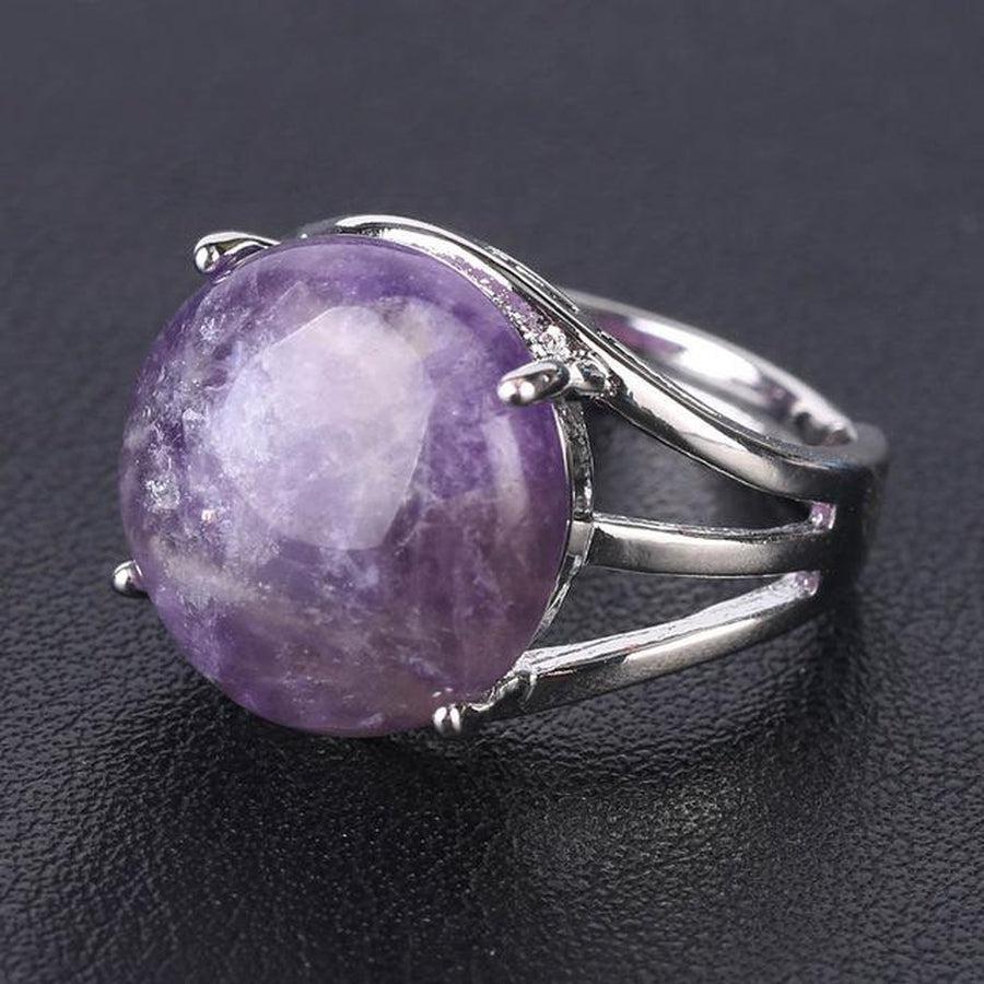 Bague cabochon en pierre sertie griffes