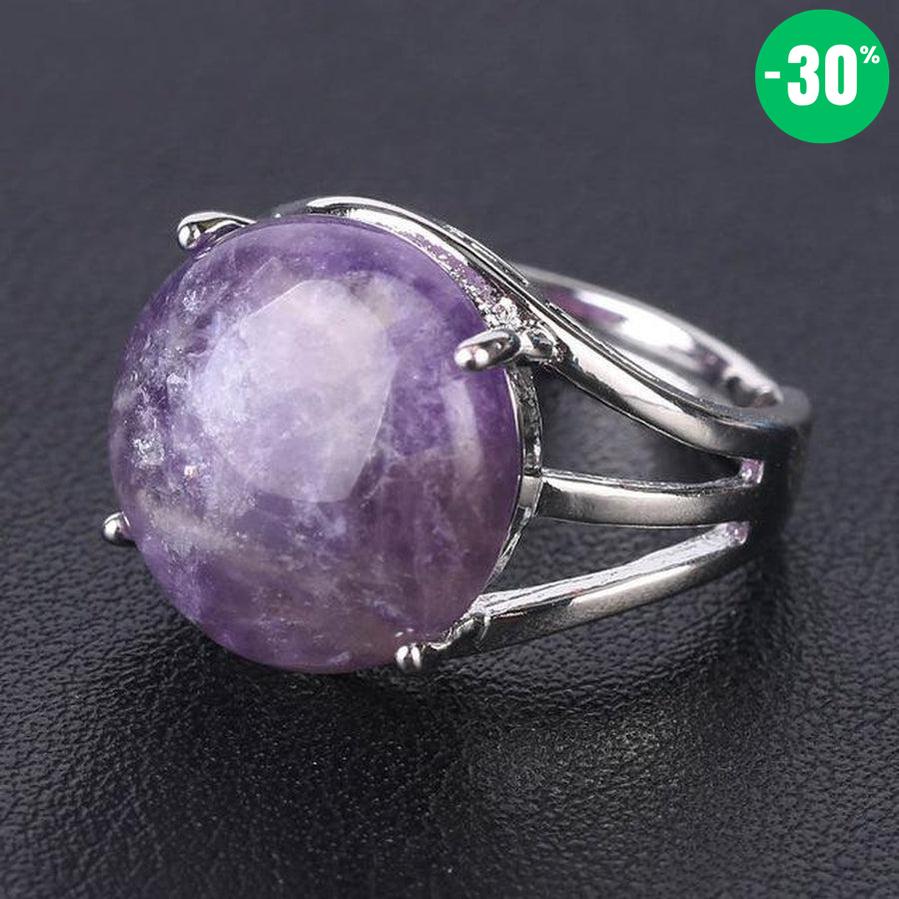 Bague cabochon en pierre sertie griffes