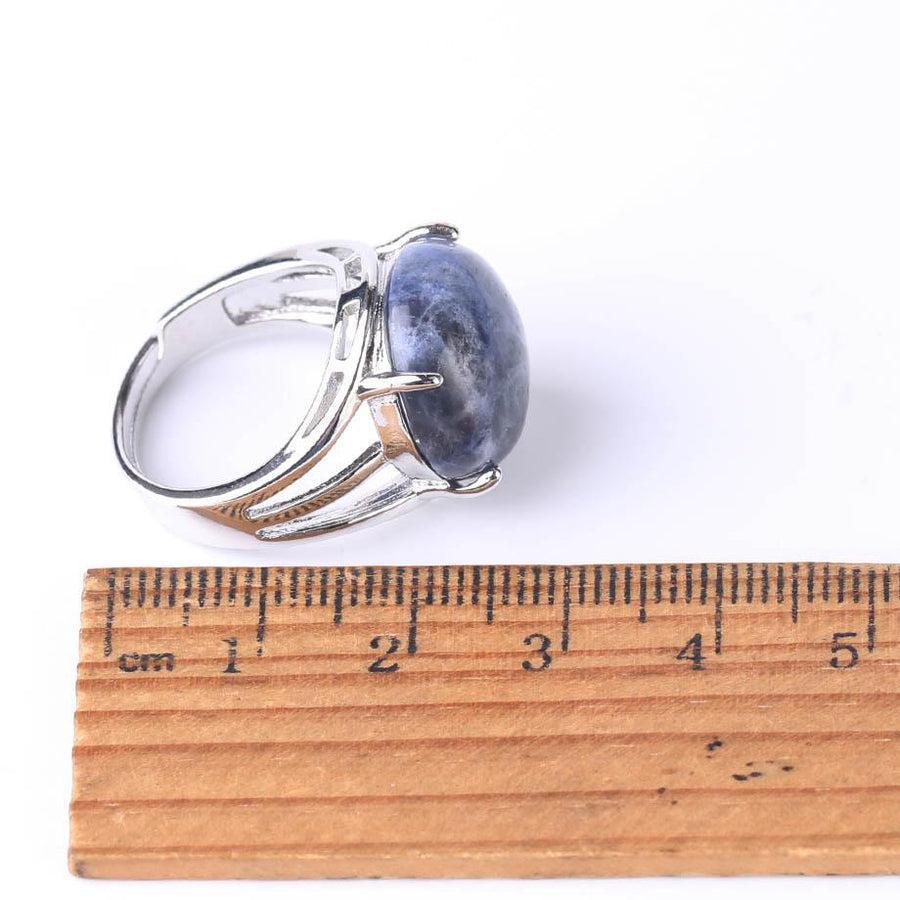 Bague cabochon en pierre sertie griffes