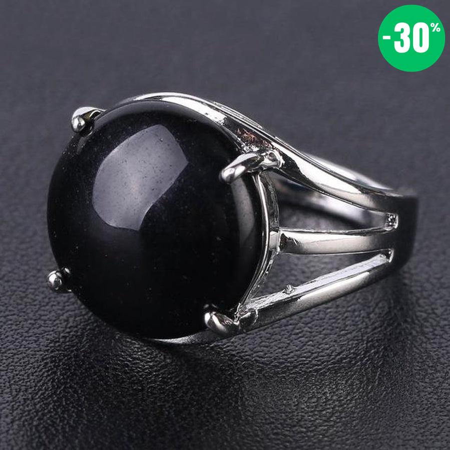 Bague cabochon en pierre sertie griffes