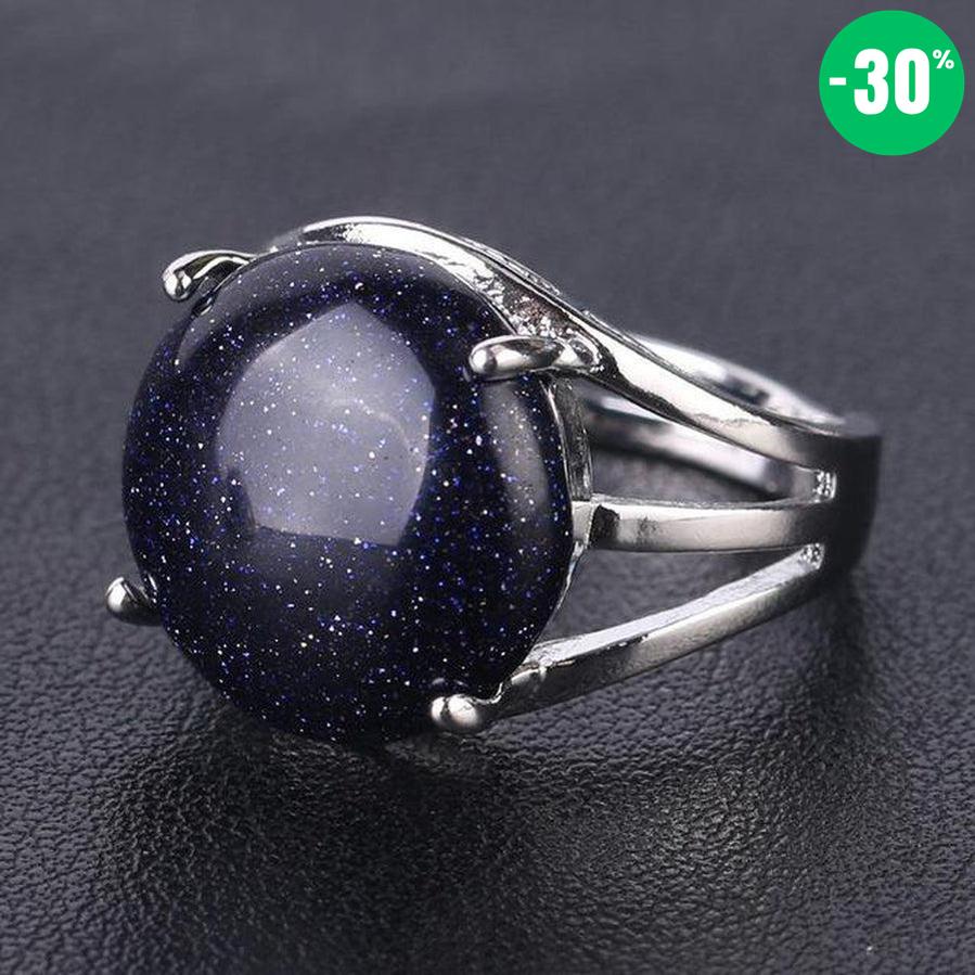 Bague cabochon en pierre sertie griffes