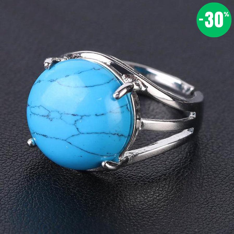 Bague cabochon en pierre sertie griffes