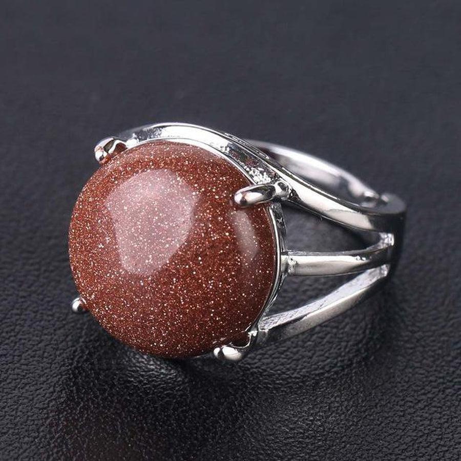 Bague cabochon en pierre sertie griffes