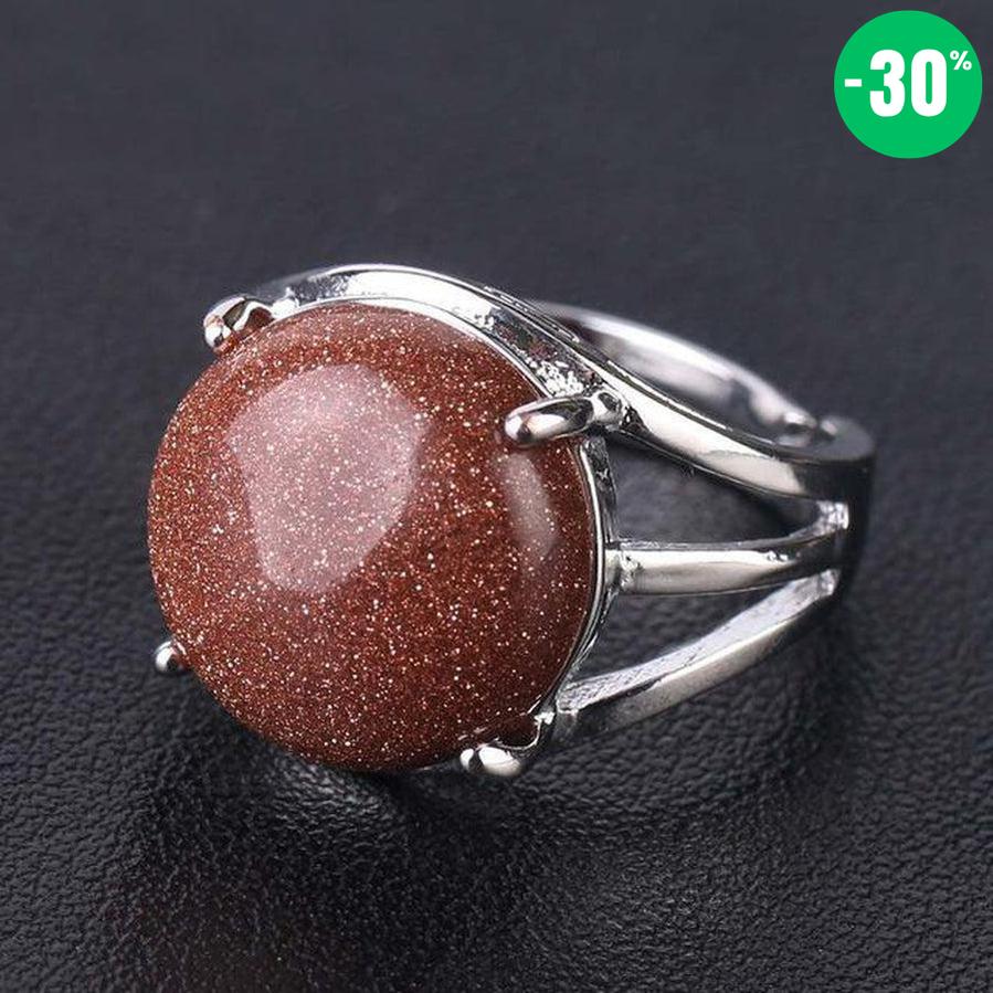 Bague cabochon en pierre sertie griffes