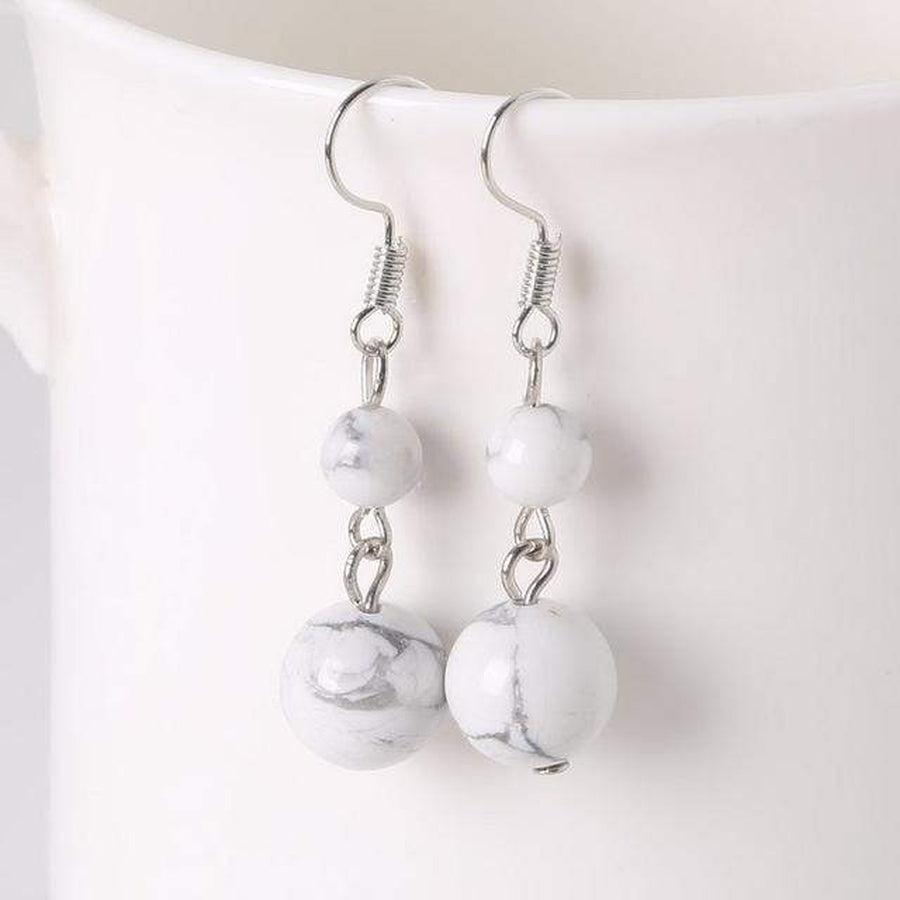 Boucles d'oreilles boules en pierres
