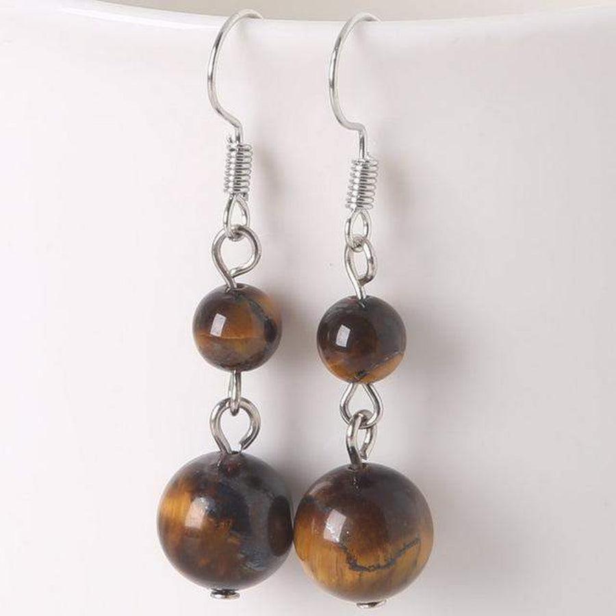 Boucles d'oreilles boules en pierres