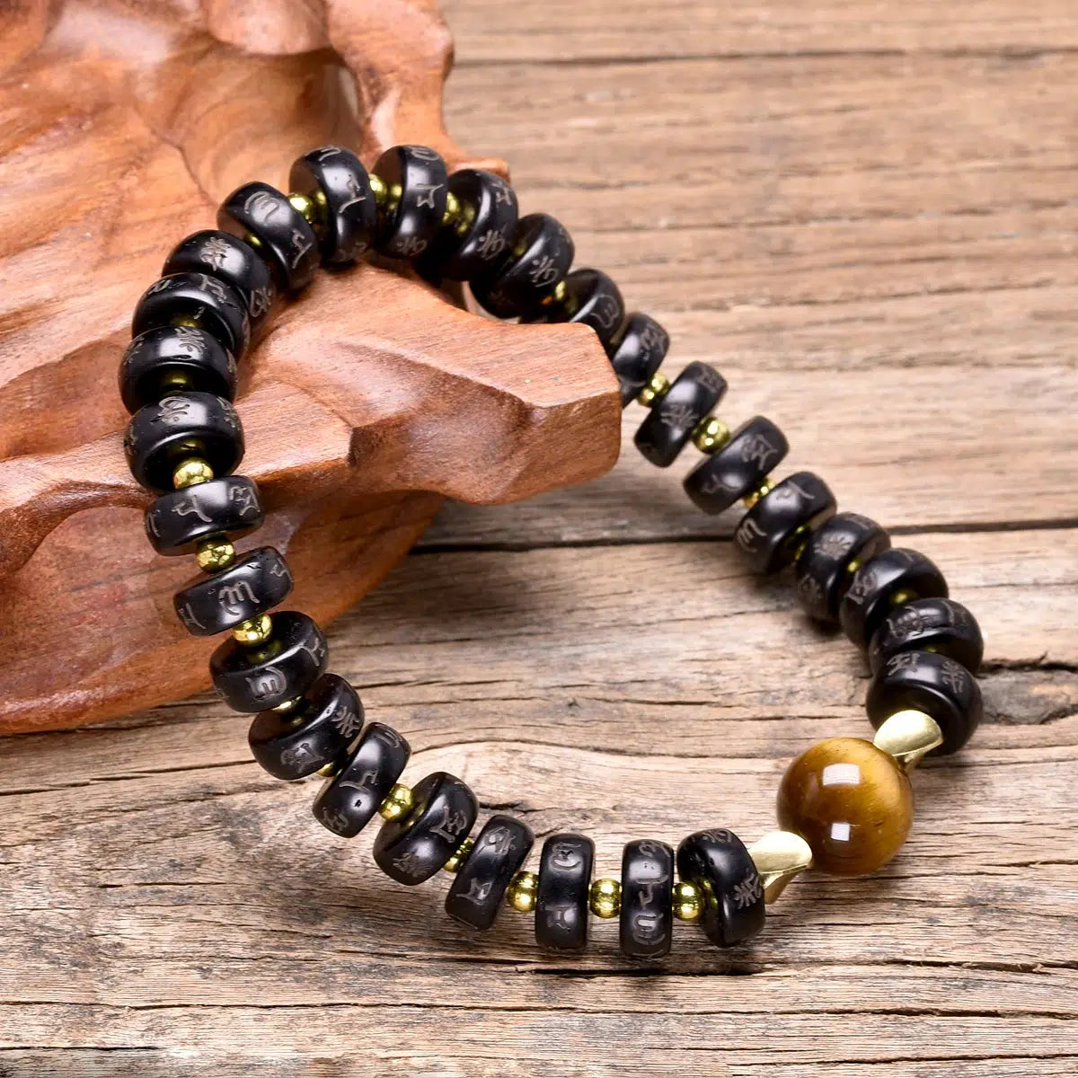 Bracelet bouddhiste en coquille de noix de coco et Œil de tigre