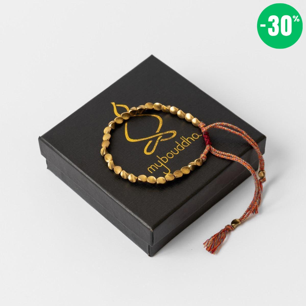 Bracelet bouddhiste en perles de cuivre et cordon coloré