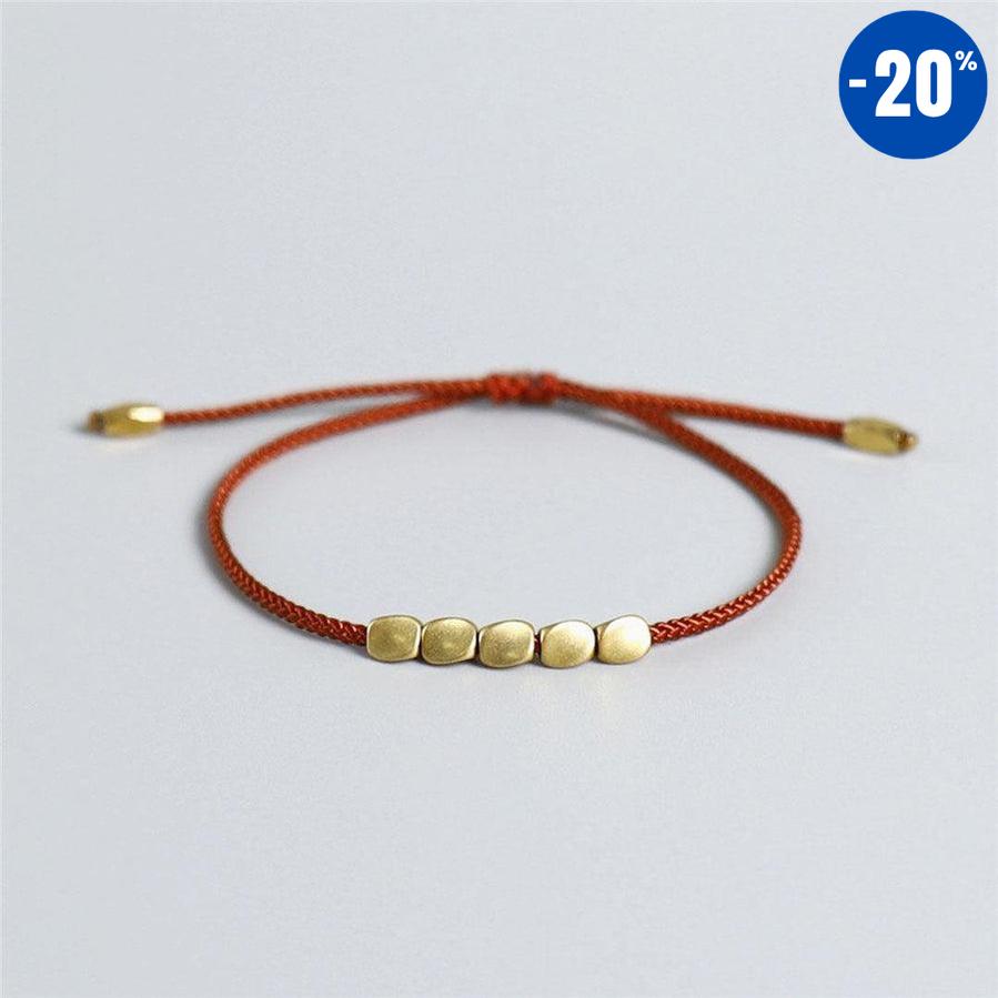 Bracelet de chance tibétain et perles de cuivre