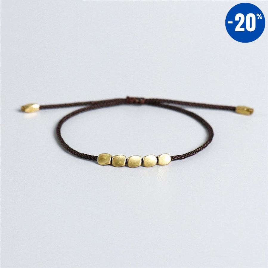 Bracelet de chance tibétain et perles de cuivre