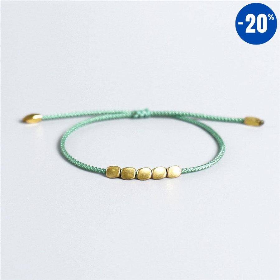 Bracelet de chance tibétain et perles de cuivre