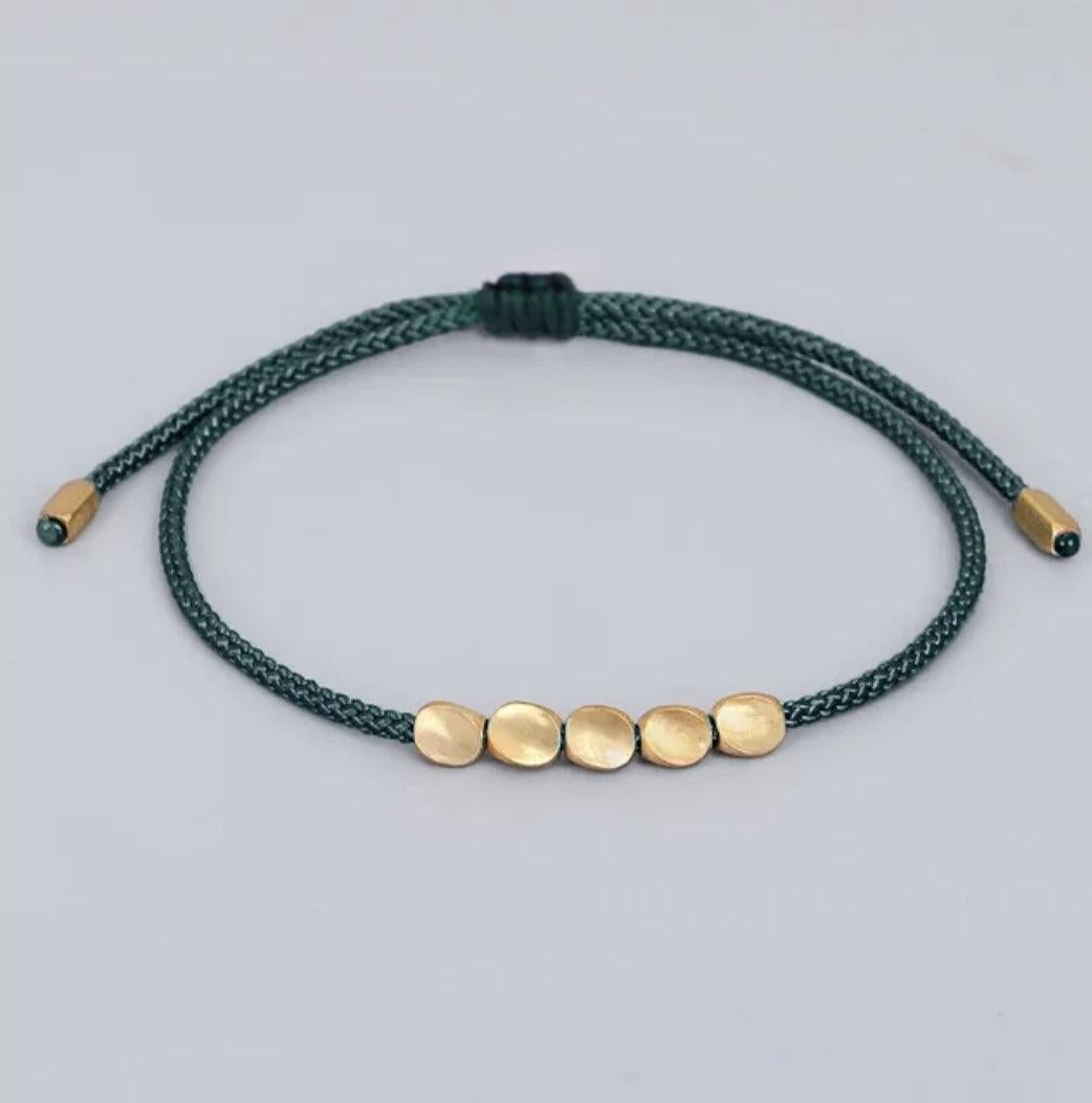 Bracelet de chance tibétain et perles de cuivre