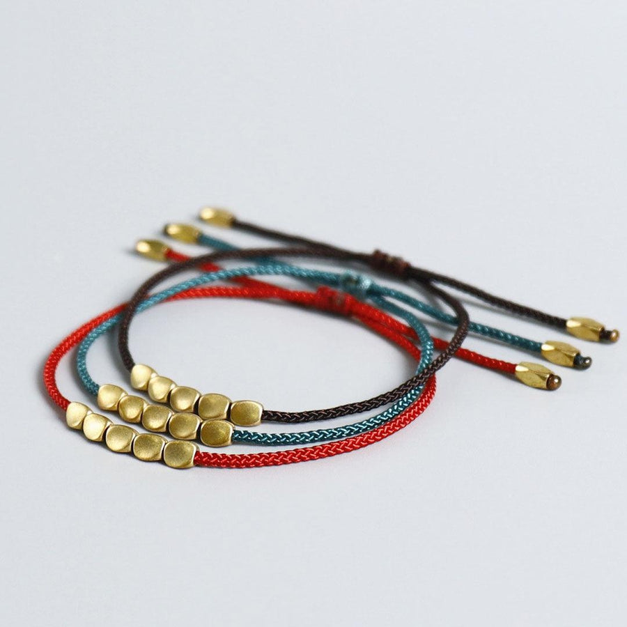 Bracelet de chance tibétain et perles de cuivre