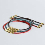 Bracelet de chance tibétain et perles de cuivre
