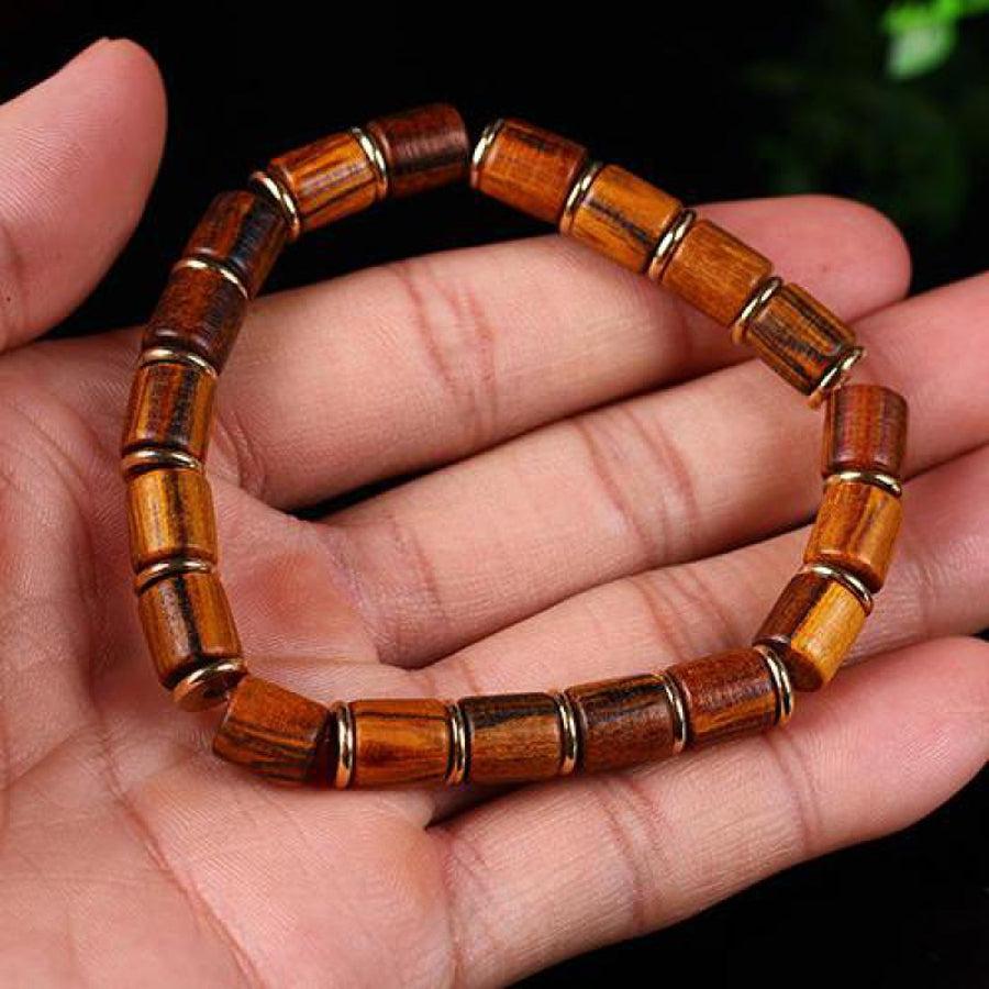 Bracelet en perles de bois de Nanmu cylindriques