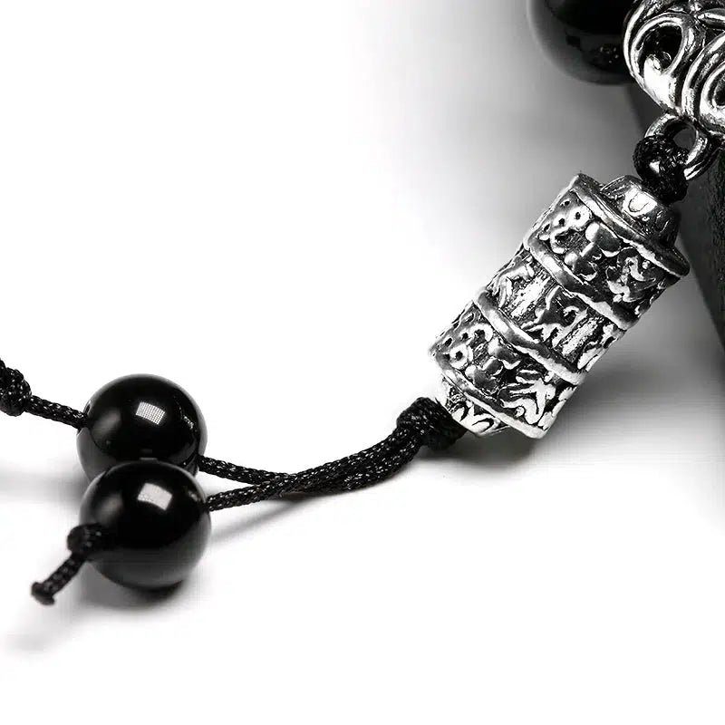 Bracelet en pierre Obsidienne noire avec breloque symbole « Om »