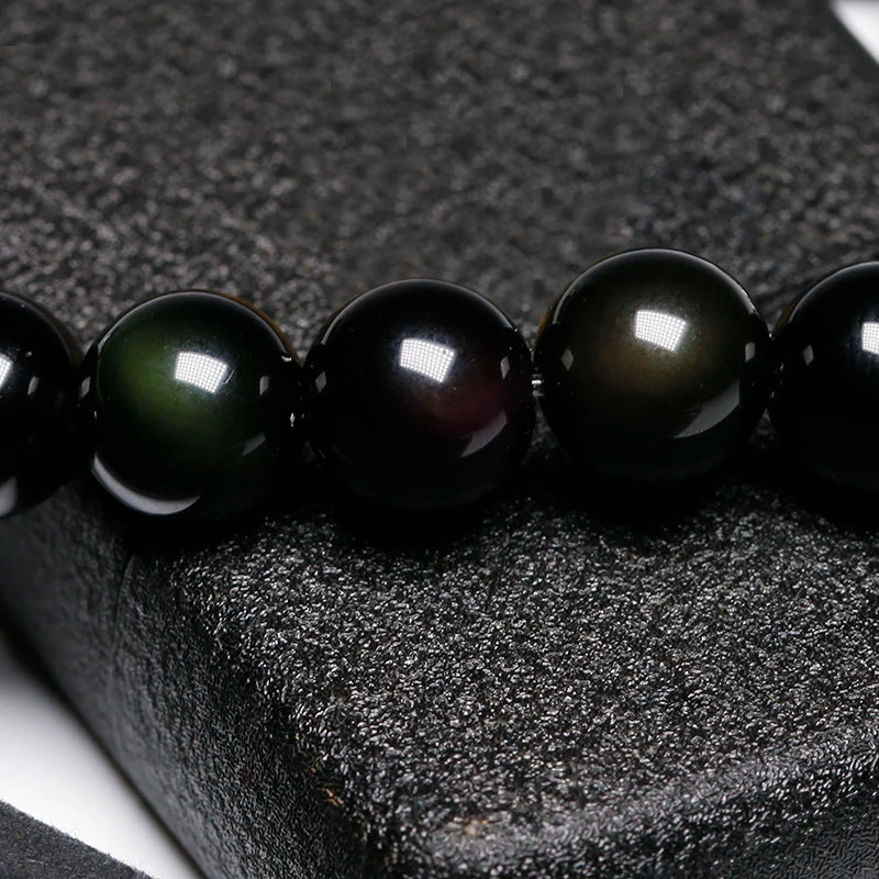 Bracelet en pierre Obsidienne noire avec breloque symbole « Om »