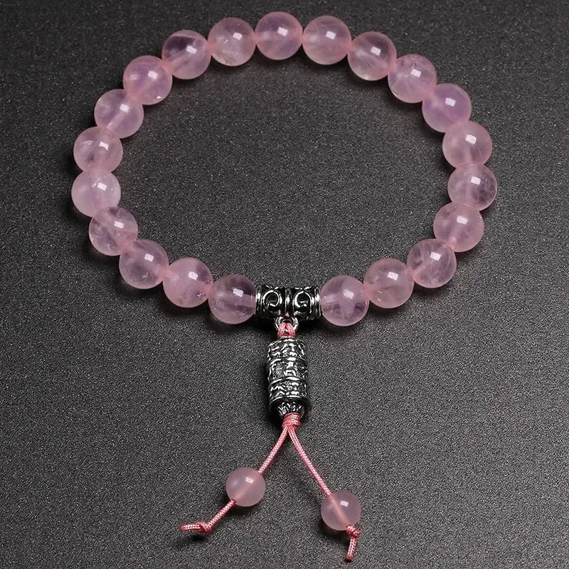 Bracelet en Quartz rose et perle centrale mantra « Om »