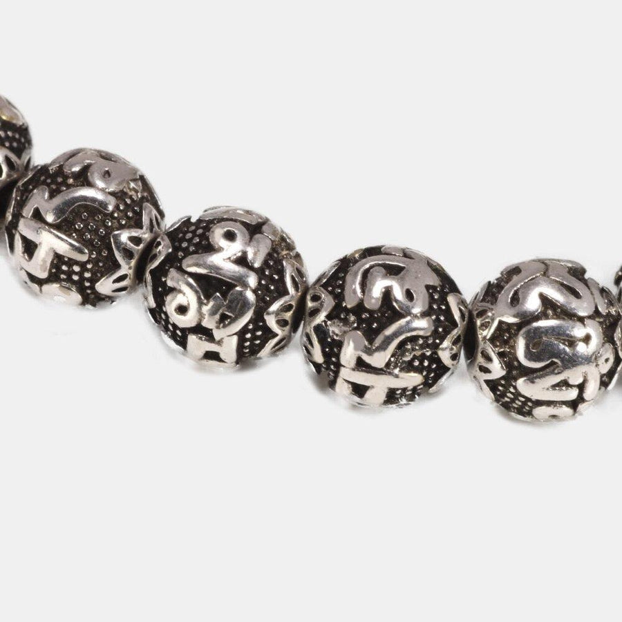 Bracelet «Paix intérieure» en cuivre antique Om Mani Padme Hum
