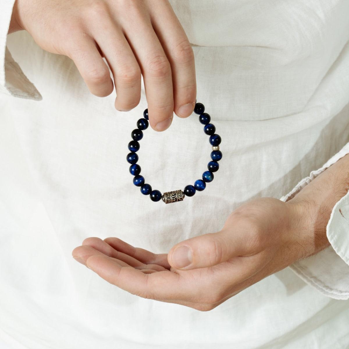 Bracelet Perles de pierres d'Œil de tigre bleu et totem bouddhiste