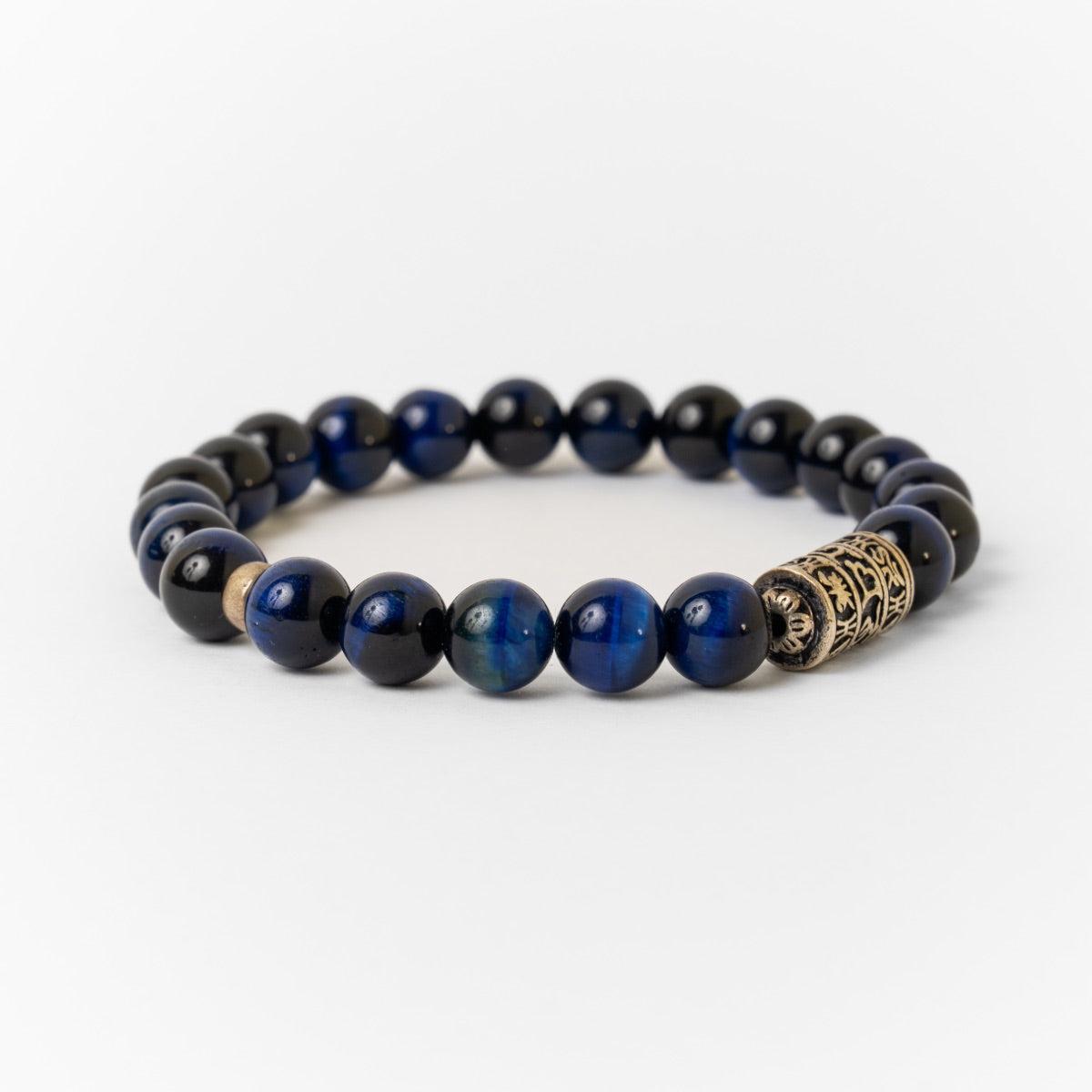 Bracelet Perles de pierres d'Œil de tigre bleu et totem bouddhiste