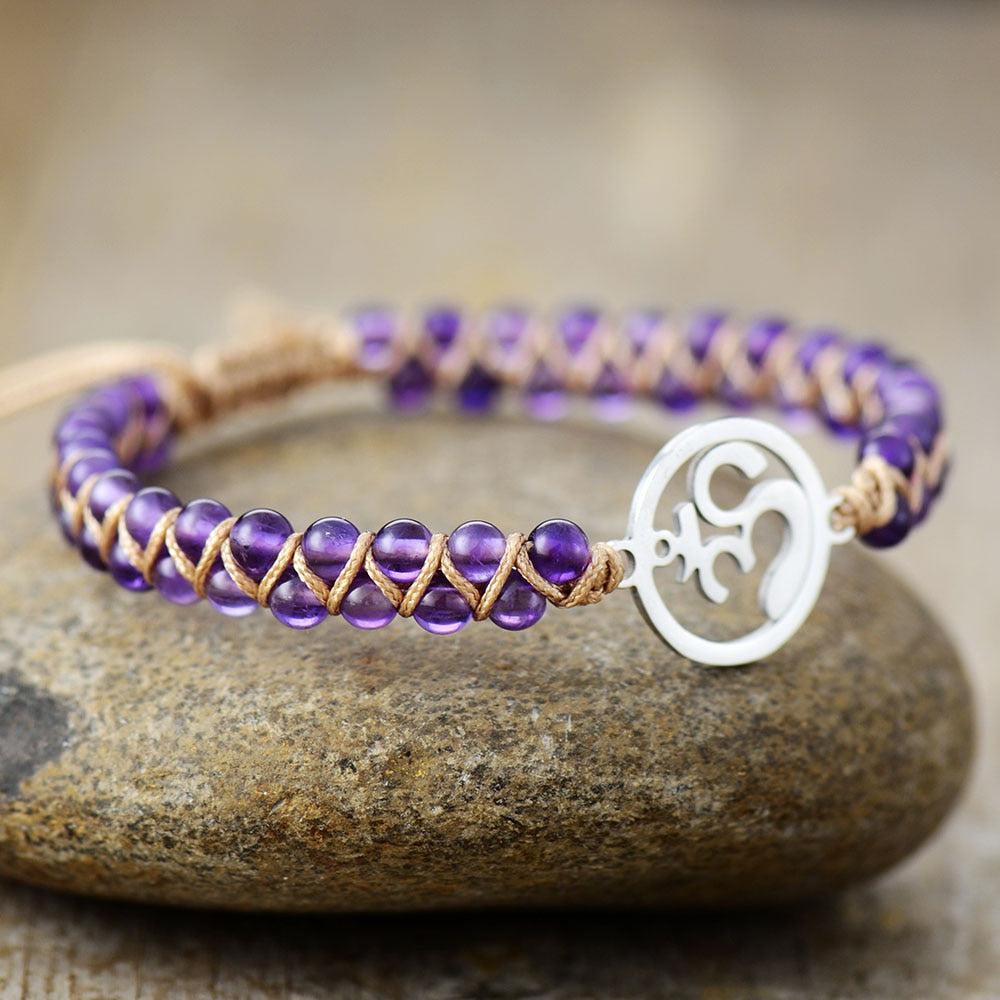 Bracelet zen en Améthyste et son symbole Om