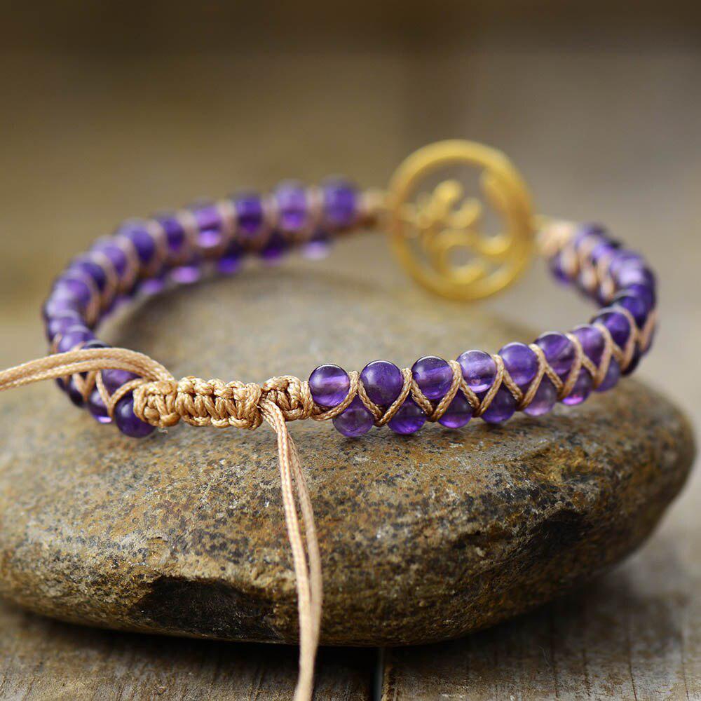 Bracelet zen en Améthyste et son symbole Om