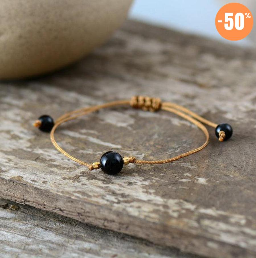 Bracelets en pierres sur cordon tressé et ciré